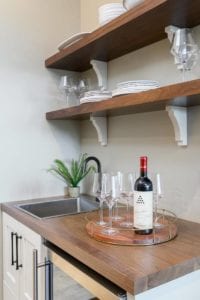 wine station with sink and shelving