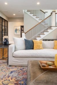 Living room with view of stairs