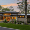 Prairie Modern Home with grass and sky behind