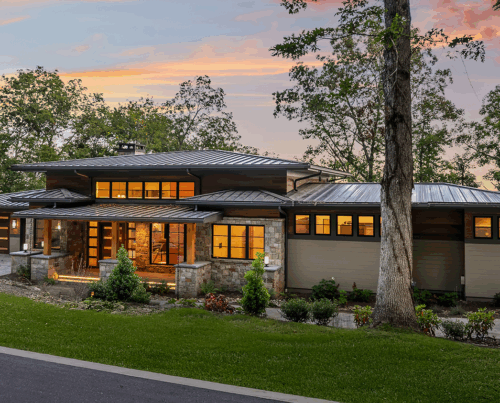 Prairie Modern Home with grass and sky behind